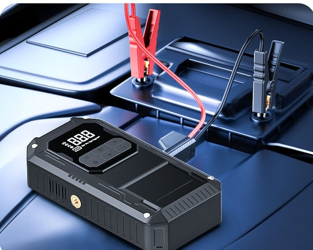 Pinces de démarrage branchées sur une batterie